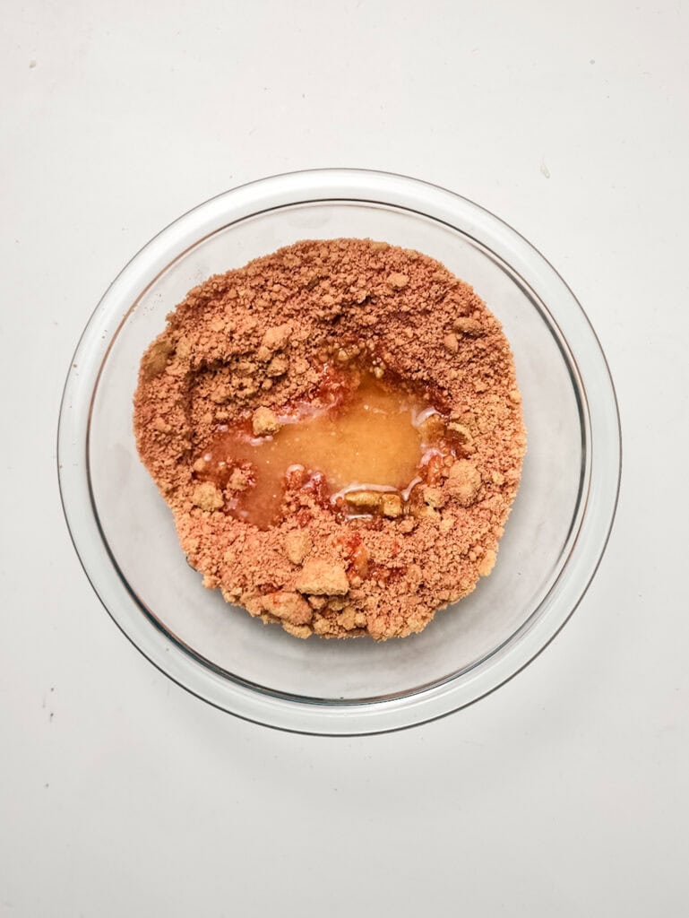 making strawberry crunch cheesecake topping for for strawberry crunch cheesecake