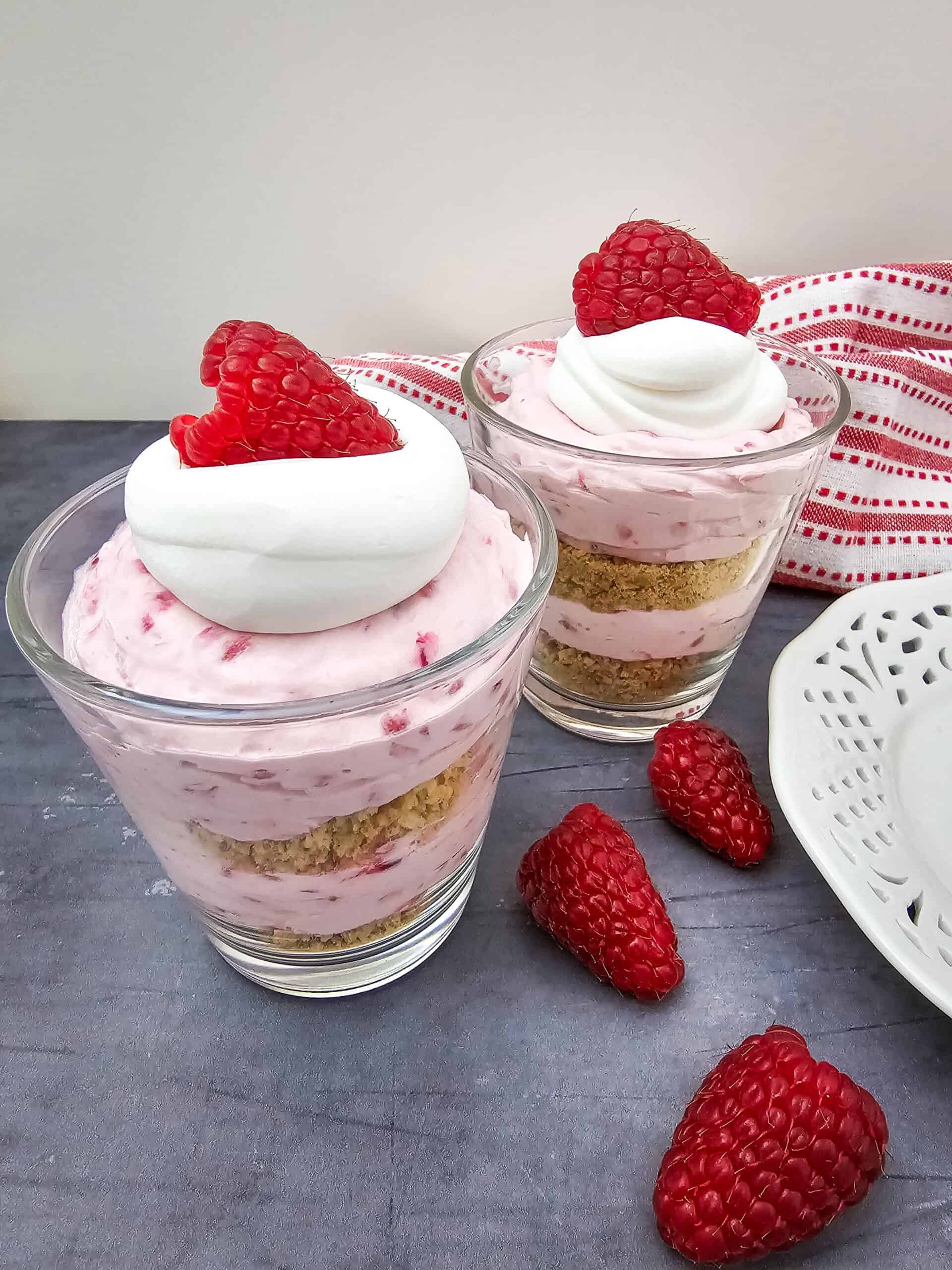 no bake raspberry cheesecake parfaits in a glass