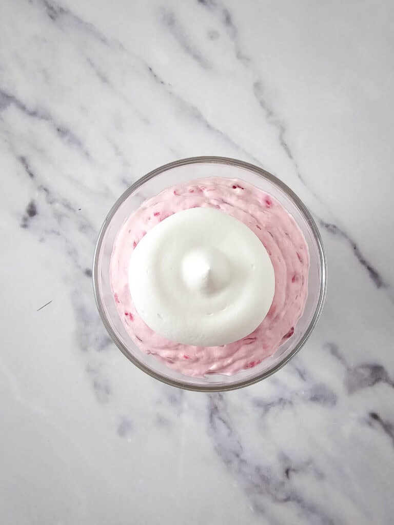 whipped cream layer for no bake raspberry cheesecake parfait