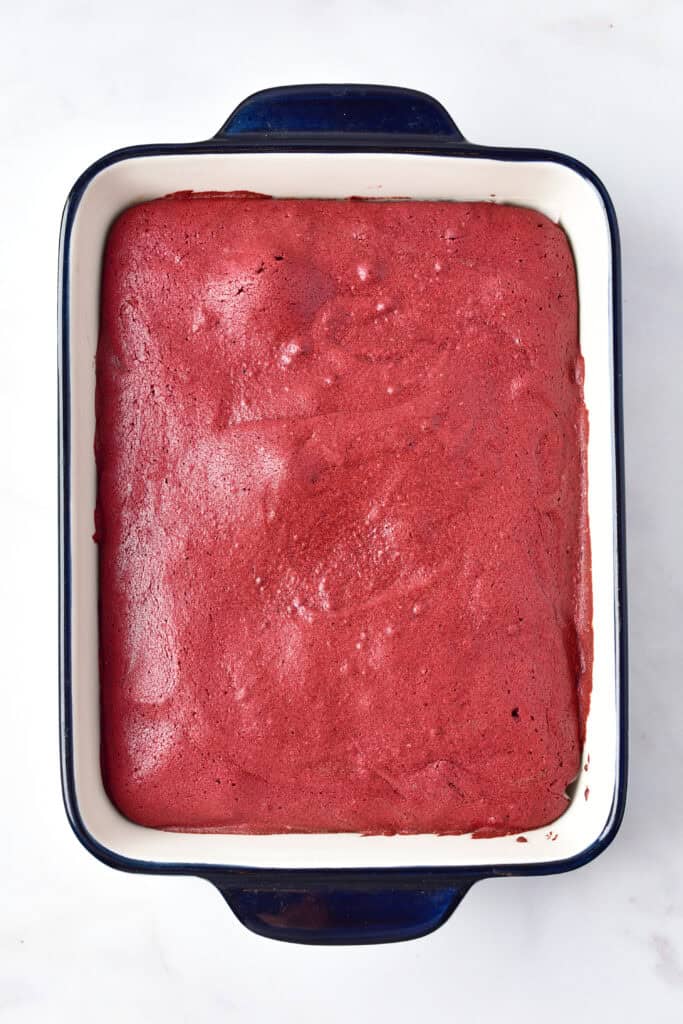 Red velvet brownies freshly baked in a rectangular pan.